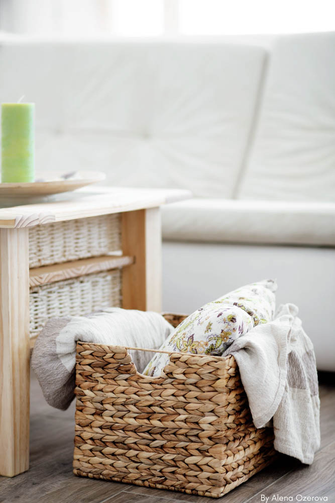 Decorative Basket Holding Pillow and Blankets