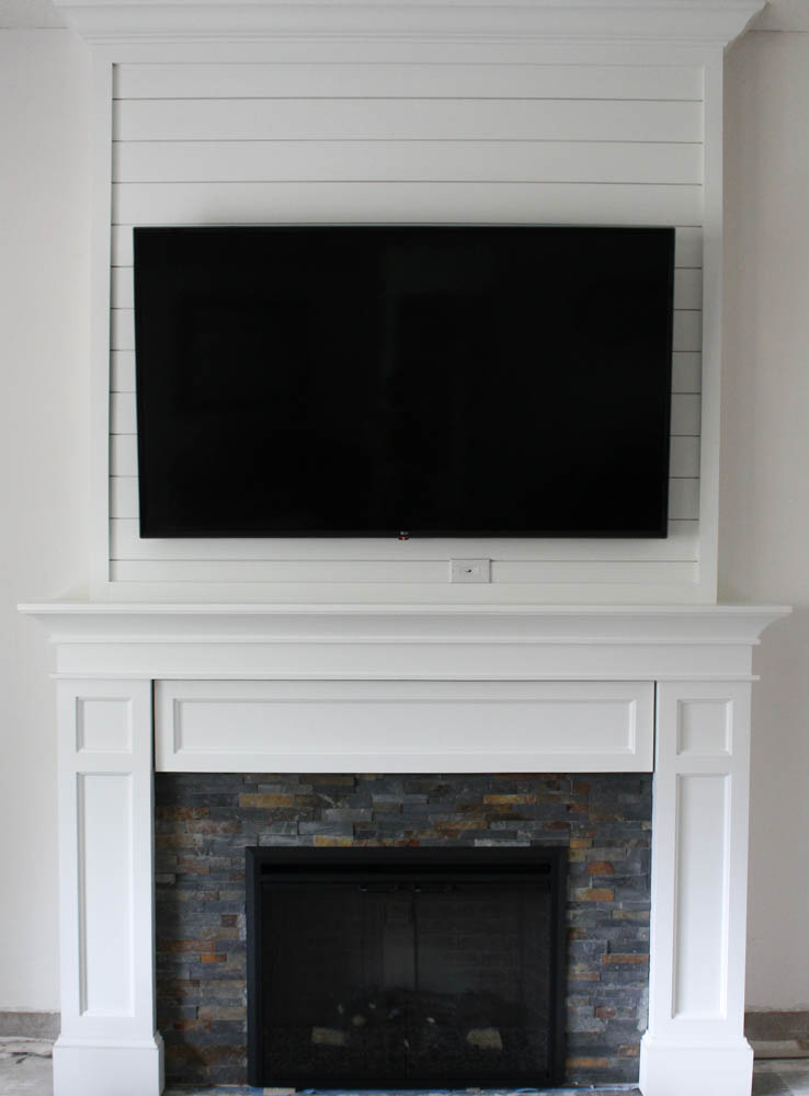 DIY Fireplace Mantel with Storage - Designed Simple