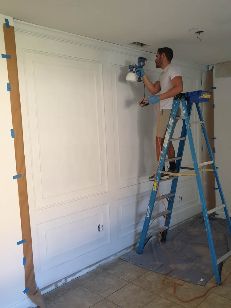 Applying First Coat Of Cabinet Paint