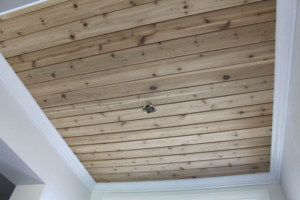 Crown Molding Surrounding Cedar Planked Ceiling