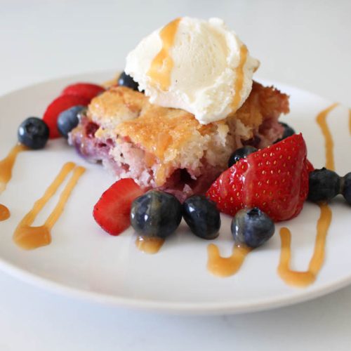 Strawberry Blueberry Cobbler With Ice Cream And Toppings
